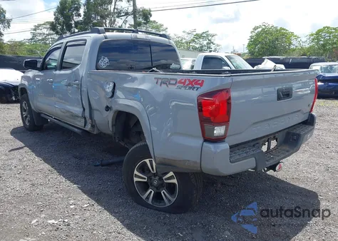 2018 Toyota Tacoma Trd Sport z USA, uszkodzony, nr VIN 3TMDZ5BN8JM048213